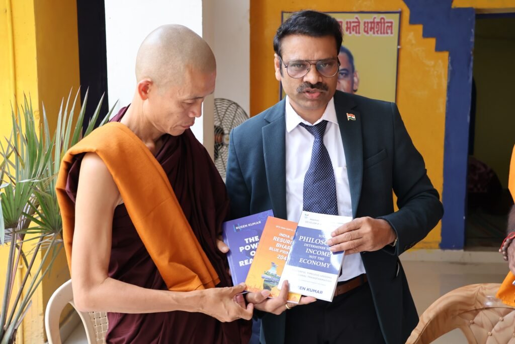 Rusen Kumar Presenting Books to Vipassana Meditation Master Dr. Ashin Ottamathara Buddhist Monk